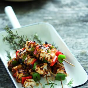 Grilled chicken on rosemary skewers