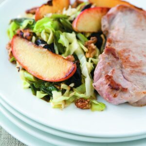Pork steaks with apple and walnut slaw